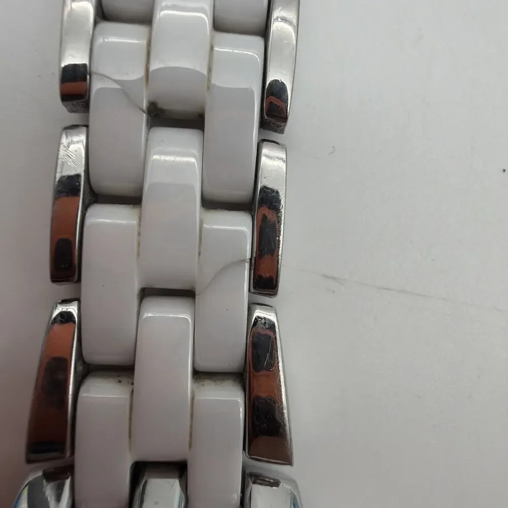 Anne Klein Women’s White Ceramic Silver Tone Watch - Read